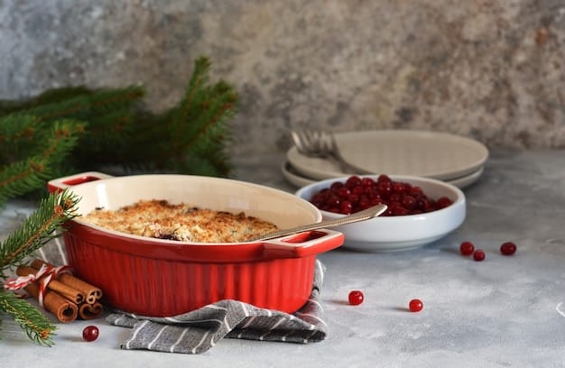 A slice of eggnog bread pudding on a plate, garnished with whipped cream and a sprinkle of nutmeg. The background shows a cozy dining room scene.