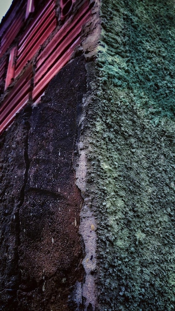A split image showing, on one side, an older, potentially hazardous environment with peeling paint and, on the other side, a modern, lead-safe home with new paint and safety features, emphasizing the difference.