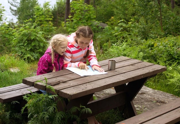 A parent sitting at a desk reviewing summer camp brochures and comparing costs on a spreadsheet. The parent is focused and determined, highlighting key information and budgeting options for summer childcare.