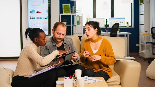 A financial advisor is meeting with a special needs family, explaining investment options and strategies tailored to their unique financial situation. The advisor is pointing to a chart that shows long-term growth projections.