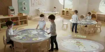 Children engaging with advanced educational technology in a modern childcare setting in 2026.